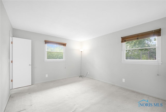 1 Hawthorne Dr, Delta, OH 43515 - unfurnished room featuring carpet and baseboards