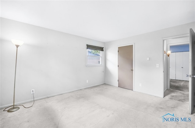 1 Hawthorne Dr, Delta, OH 43515 - unfurnished bedroom with carpet flooring and baseboards