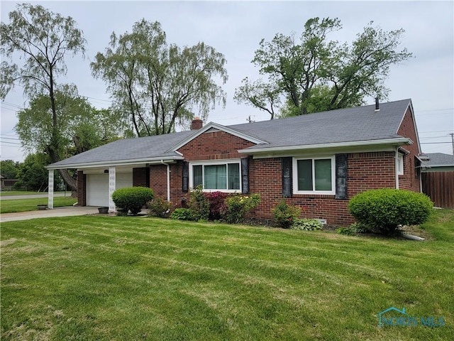 3434 Muirfield Ave, Toledo, OH 43614 - ranch-style house featuring brick siding, an attached garage, driveway, and a chimney
