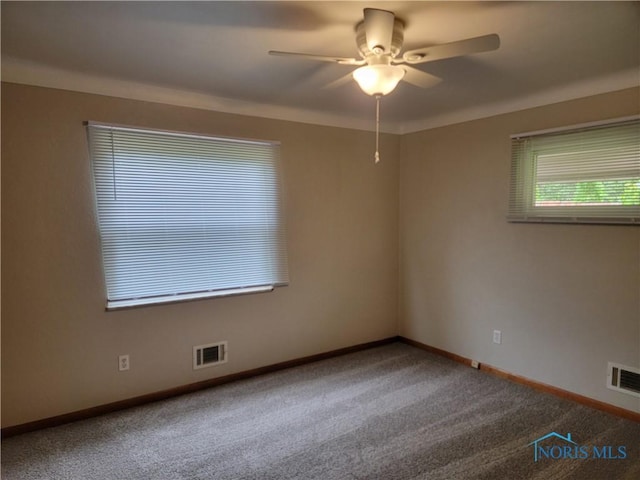 3434 Muirfield Ave, Toledo, OH 43614 - empty room with ceiling fan, carpet, and baseboards