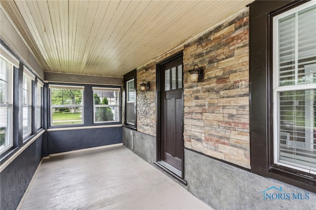 430 E 3rd St, Ottawa, OH 45875 - unfurnished sunroom featuring wood ceiling and baseboards