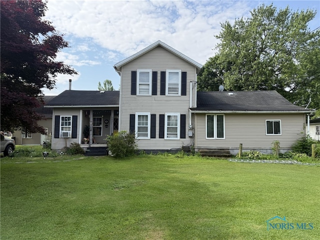 201 W Wabash St, Liberty Center, OH 43532 - traditional home featuring a front yard