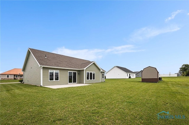 116 Wirth Ln, Sherwood, OH 43556 - back of house featuring a patio, a lawn, and roof with shingles