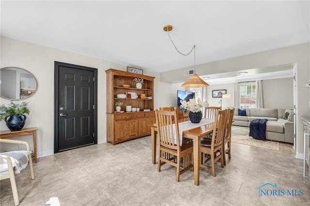 524 Sutton Pl, Findlay, OH 45840 - dining room featuring baseboards
