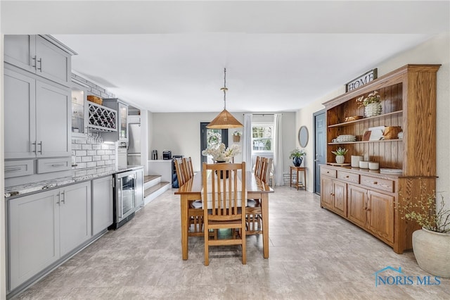 524 Sutton Pl, Findlay, OH 45840 - dining area with wine cooler