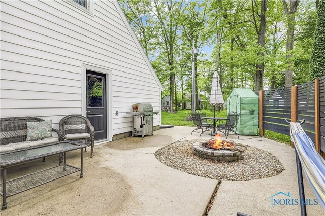 524 Sutton Pl, Findlay, OH 45840 - view of patio with area for grilling and an outdoor fire pit