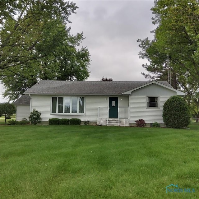 15979 Hill Rd, Defiance, OH 43512 - ranch-style home featuring a front yard and a shingled roof