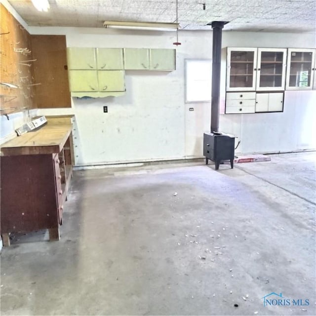 15979 Hill Rd, Defiance, OH 43512 - garage with a wood stove