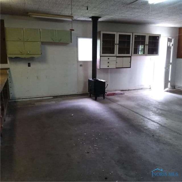 15979 Hill Rd, Defiance, OH 43512 - garage featuring a wood stove