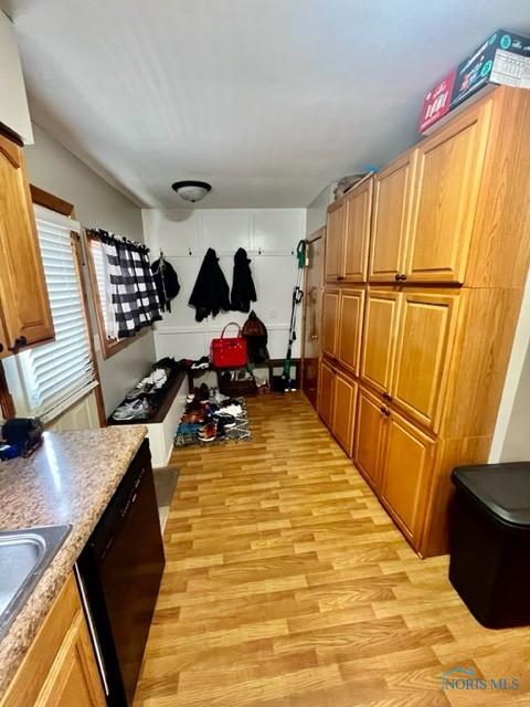 663 W Summit St, Fostoria, OH 44830 - mudroom with light wood-style floors and a sink