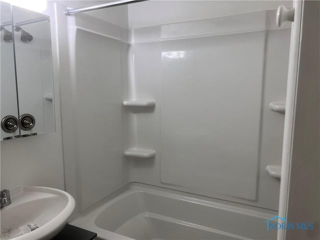 2134 Tedrow Rd, Toledo, OH 43614 - bathroom featuring a sink and shower / tub combination