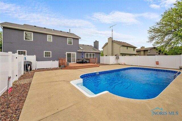117 Freedom Ln, Waterville, OH 43566 - view of swimming pool featuring a fenced backyard, a patio, and a deck