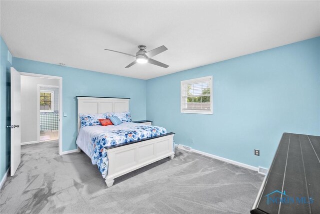 117 Freedom Ln, Waterville, OH 43566 - bedroom featuring light carpet, baseboards, and ceiling fan