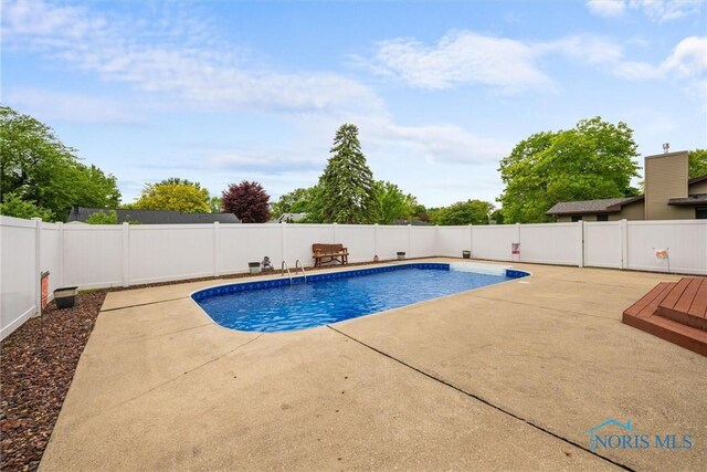 117 Freedom Ln, Waterville, OH 43566 - view of swimming pool with a patio area and a fenced backyard