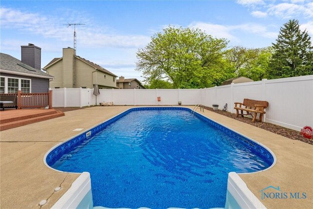 117 Freedom Ln, Waterville, OH 43566 - view of pool featuring a fenced backyard, a wooden deck, and a patio area
