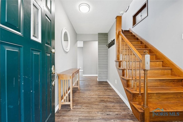 13914 Devils Hole Rd, Bowling Green, OH 43402 - entrance foyer with stairs, wood finished floors, and baseboards
