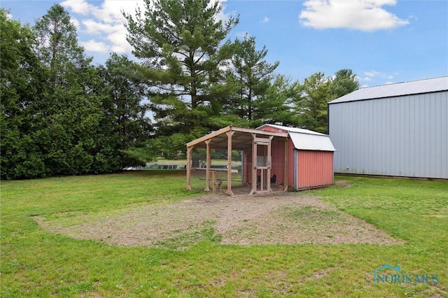 13914 Devils Hole Rd, Bowling Green, OH 43402 - view of green lawn with an outdoor structure and exterior structure