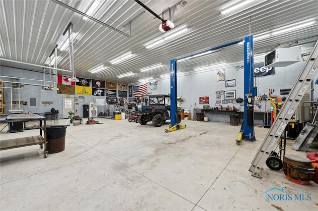 13914 Devils Hole Rd, Bowling Green, OH 43402 - garage featuring a workshop area and a garage door opener