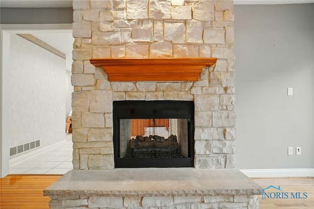 3236 Deep Water Ln, Maumee, OH 43537 - detailed view of a stone fireplace and baseboards