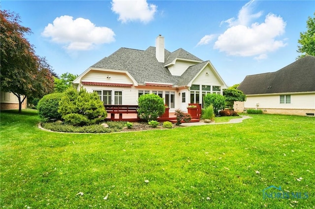 3236 Deep Water Ln, Maumee, OH 43537 - back of property with a wooden deck, a chimney, a yard, and a shingled roof
