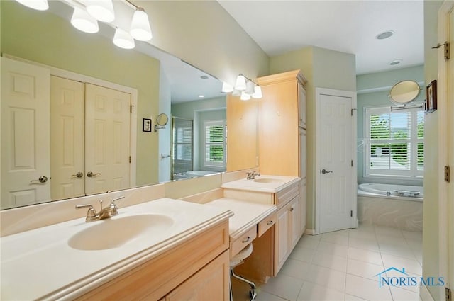 3236 Deep Water Ln, Maumee, OH 43537 - full bath with double vanity, a bath, tile patterned flooring, and a shower with shower door