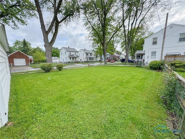 4635 Vermaas Ave, Toledo, OH 43612 - view of yard featuring a residential view and a detached garage