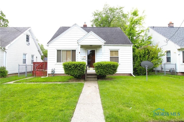 905 Eleanor Ave, Toledo, OH 43612 - bungalow featuring a chimney and a shingled roof
