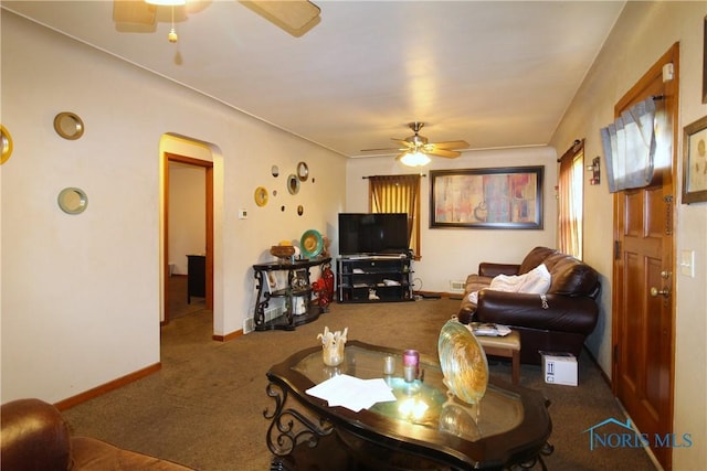 905 Eleanor Ave, Toledo, OH 43612 - carpeted living area featuring ceiling fan, arched walkways, and baseboards