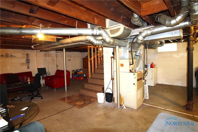 905 Eleanor Ave, Toledo, OH 43612 - unfinished basement featuring stairs, washer / clothes dryer, and heating unit