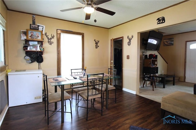 2544 110th St, Toledo, OH 43611 - dining area featuring ceiling fan, wood finished floors, and ornamental molding
