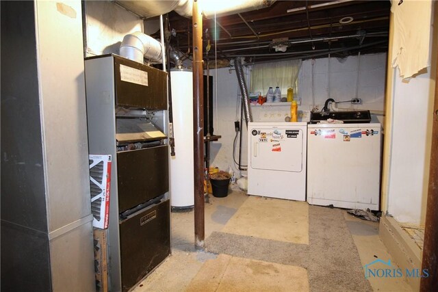 2544 110th St, Toledo, OH 43611 - unfinished basement featuring separate washer and dryer and water heater