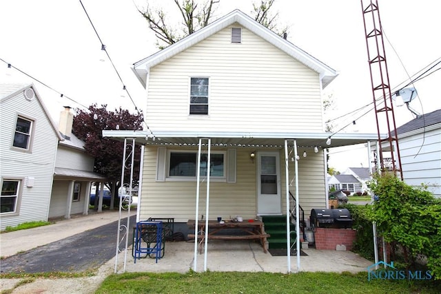 2544 110th St, Toledo, OH 43611 - rear view of property with entry steps