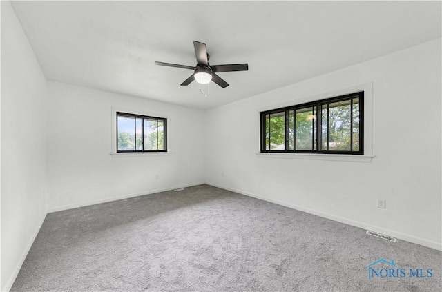 3407 Waterville Swanton Rd, Swanton, OH 43558 - unfurnished room with carpet floors, a ceiling fan, and baseboards