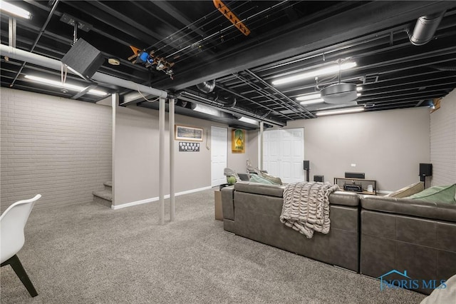 819 Wood Sorrel Ln, Perrysburg, OH 43551 - living room with carpet floors, stairs, baseboards, and brick wall