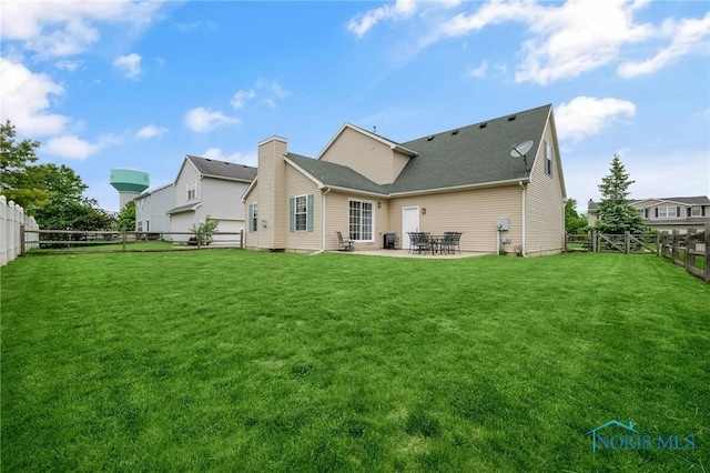 819 Wood Sorrel Ln, Perrysburg, OH 43551 - rear view of house with a patio