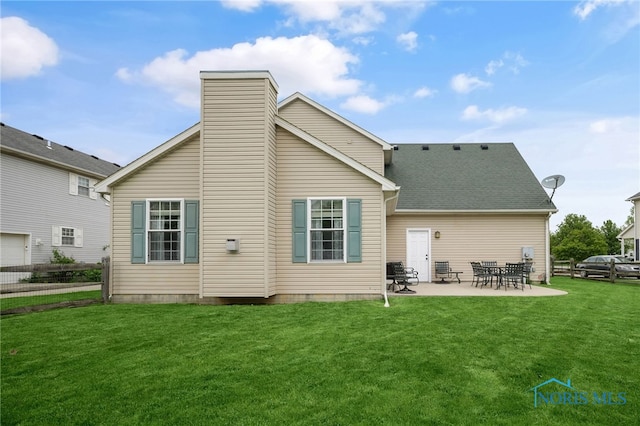 819 Wood Sorrel Ln, Perrysburg, OH 43551 - rear view of property with a patio area and a chimney