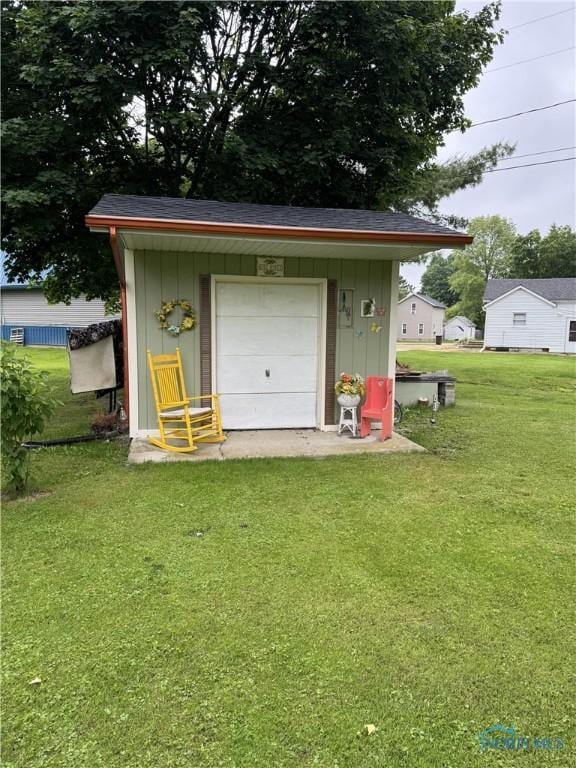 1505 W St, Evansport, OH 43519 - garage featuring a storage unit