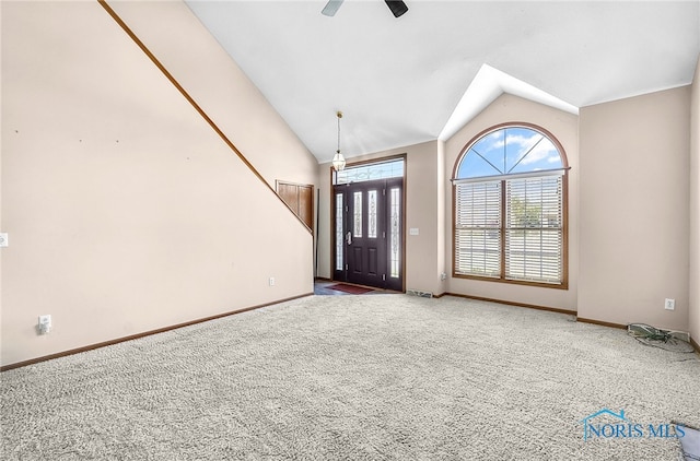 7195 Twin Lakes Rd, Perrysburg, OH 43551 - entrance foyer with carpet floors, lofted ceiling, baseboards, and a ceiling fan