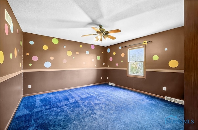 7195 Twin Lakes Rd, Perrysburg, OH 43551 - carpeted spare room featuring ceiling fan, a textured ceiling, and baseboards