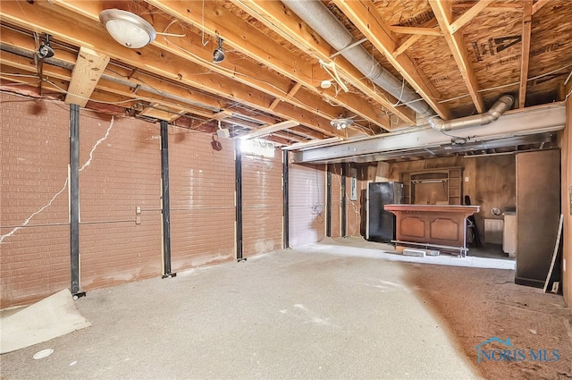 7195 Twin Lakes Rd, Perrysburg, OH 43551 - unfinished below grade area featuring freestanding refrigerator