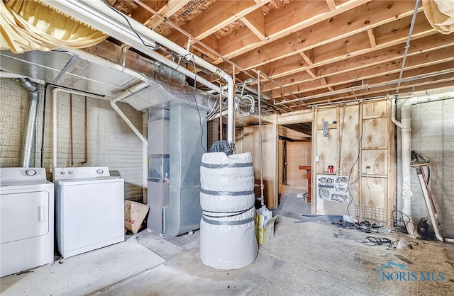 7195 Twin Lakes Rd, Perrysburg, OH 43551 - unfinished basement featuring washing machine and clothes dryer and heating unit