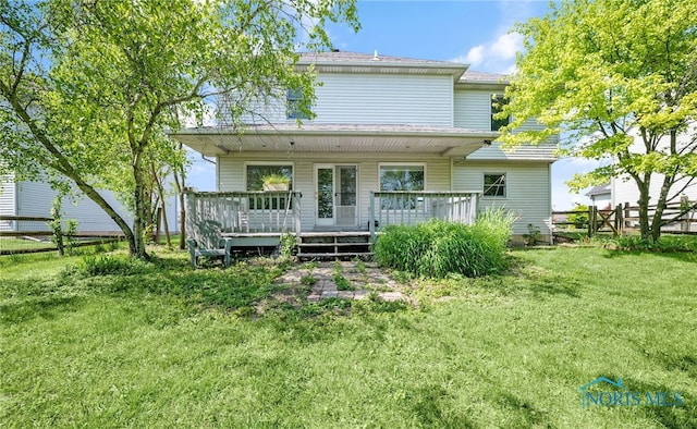 7195 Twin Lakes Rd, Perrysburg, OH 43551 - rear view of property with a deck