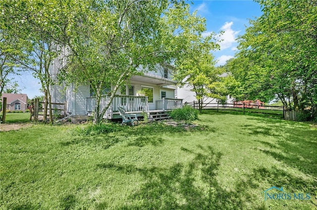 7195 Twin Lakes Rd, Perrysburg, OH 43551 - view of yard featuring a wooden deck