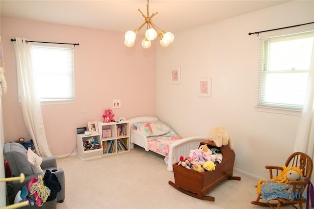 615 Hillcrest Ave, Findlay, OH 45840 - carpeted bedroom with a chandelier