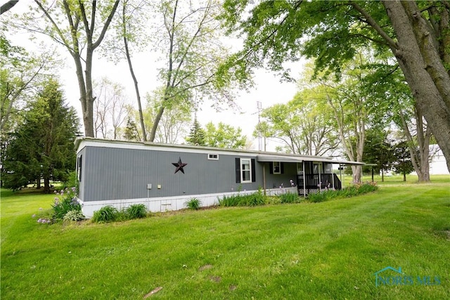 28916 Blanchard Rd, Defiance, OH 43512 - rear view of house with a lawn