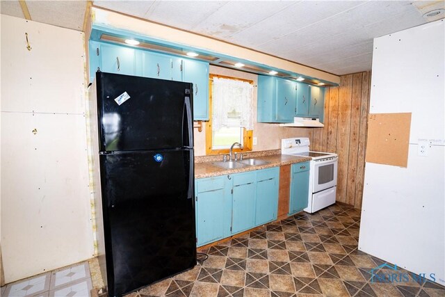 28916 Blanchard Rd, Defiance, OH 43512 - kitchen featuring freestanding refrigerator, white range with electric cooktop, a sink, under cabinet range hood, and blue cabinets