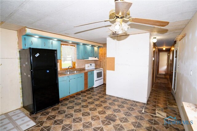 28916 Blanchard Rd, Defiance, OH 43512 - kitchen with freestanding refrigerator, white electric stove, blue cabinets, and a sink