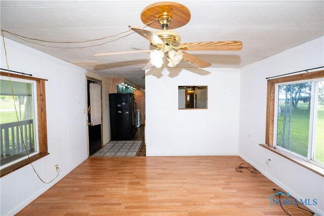 28916 Blanchard Rd, Defiance, OH 43512 - empty room with light wood finished floors and a ceiling fan
