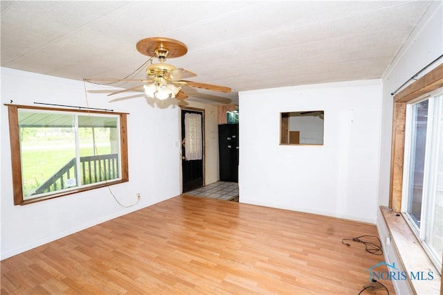 28916 Blanchard Rd, Defiance, OH 43512 - unfurnished room with wood finished floors and ceiling fan