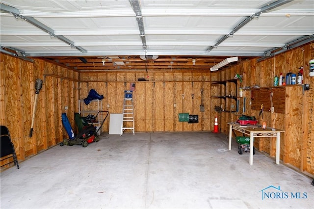 1618 S Clinton St, Defiance, OH 43512 - garage featuring wooden walls
